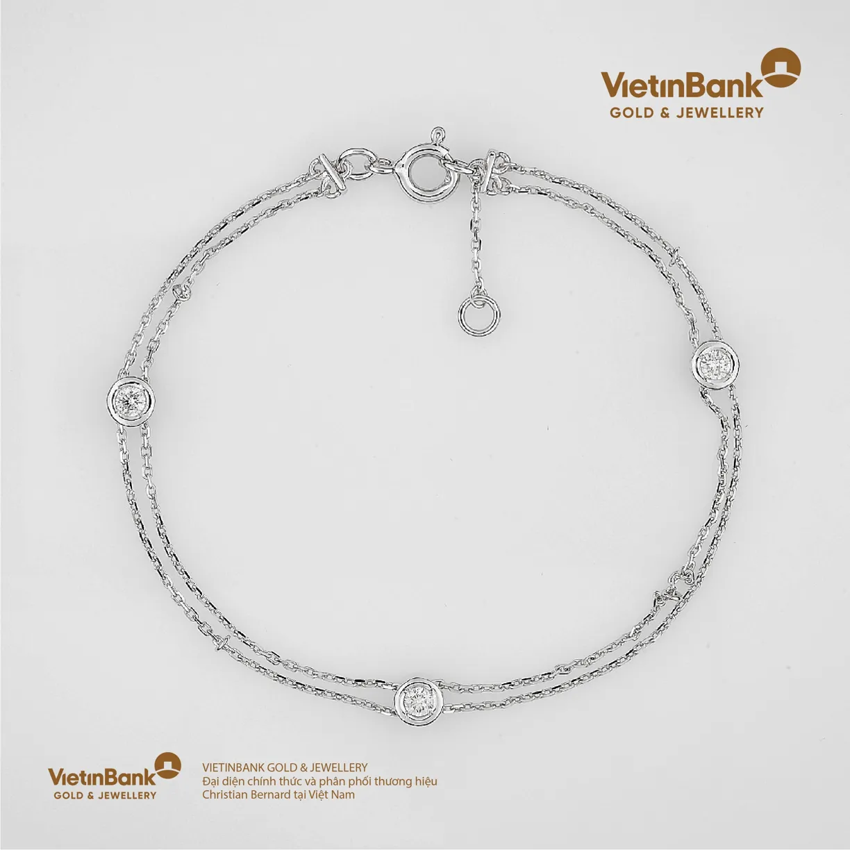 Lắc vàng trắng 18K (2.303) gắn Kim Cương (0.183)