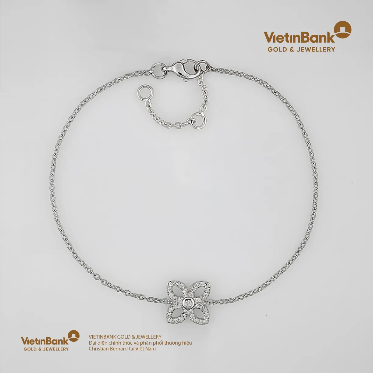 Lắc vàng trắng 18K (2.414) gắn Kim Cương (0.179)