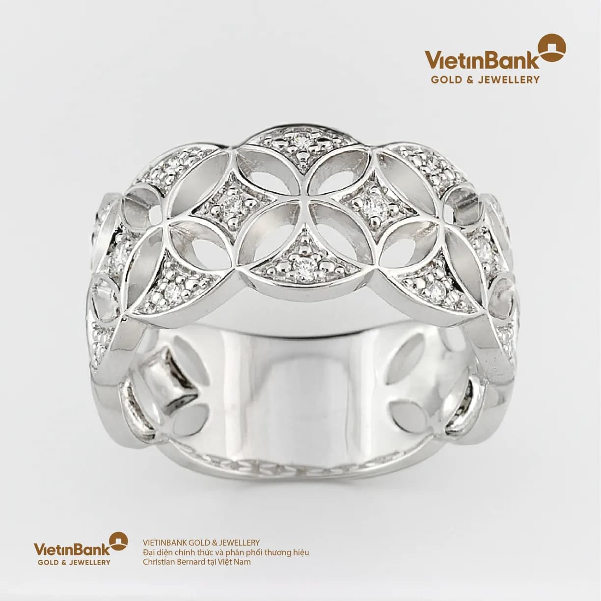Nhẫn vàng trắng 18K (5.514) gắn Kim Cương (0.132) 53