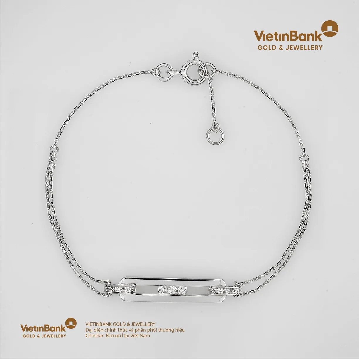 Lắc vàng trắng 18K (2.287) gắn Kim Cương (0.114)