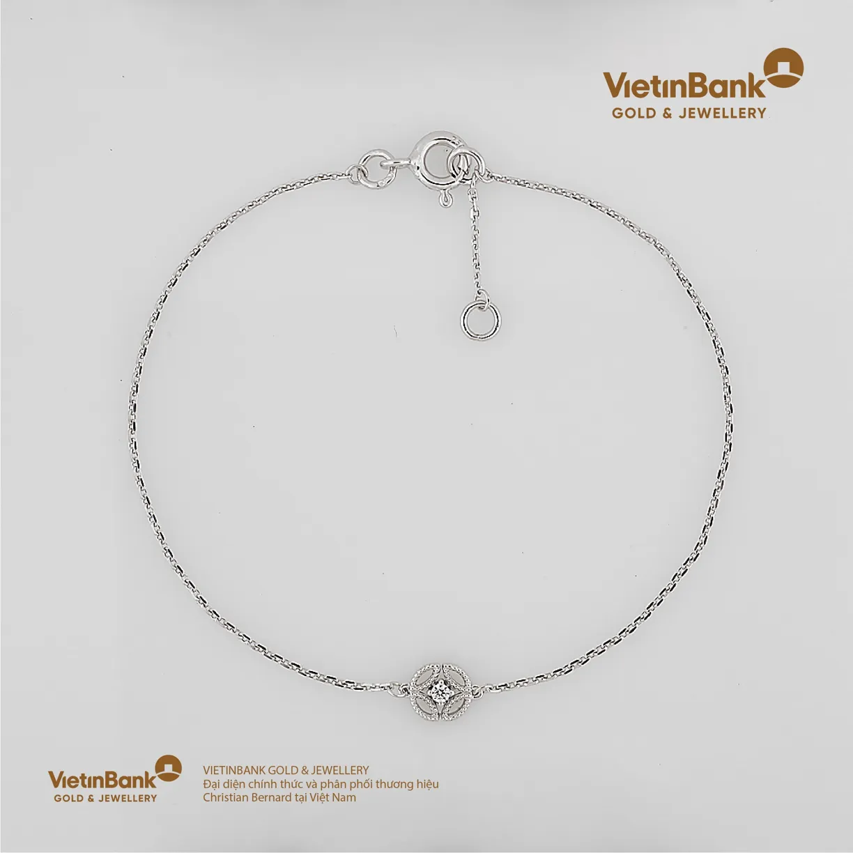 Lắc vàng trắng 18K (1.146) gắn Kim Cương (0.021)