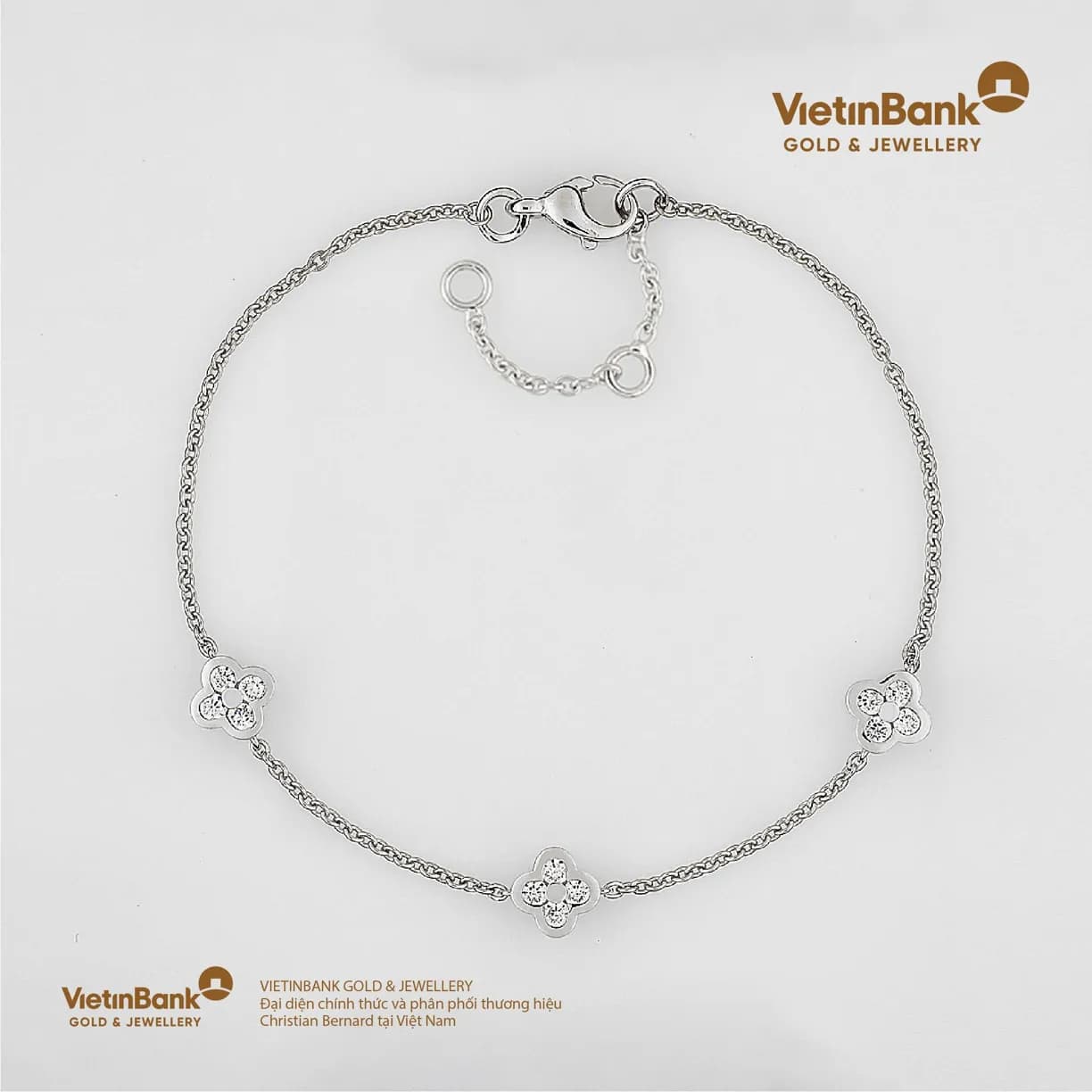 Lắc vàng trắng 18K (2.938) gắn Kim Cương (0.36)